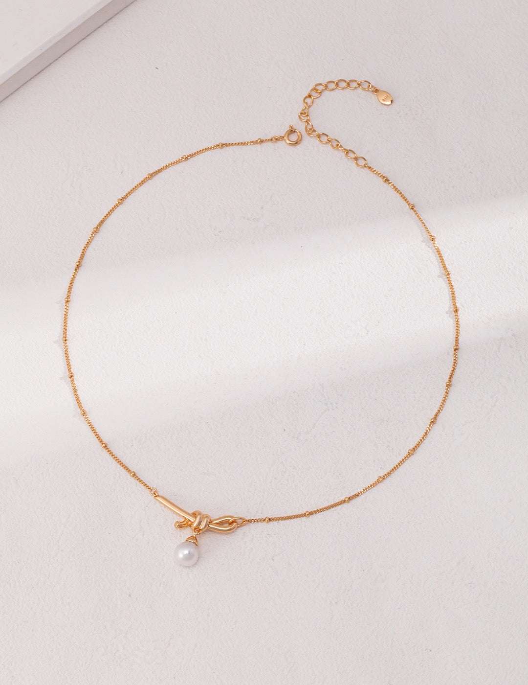 Knot Pearl Pendant Necklace – 925 Sterling Silver, 18K Retro Gold - TAMO Jewellery